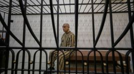 Suriye’de Esad ve kardeşinin gıyabi yargılanması başladı. İşkenceci kuzen kafeste tutuldu